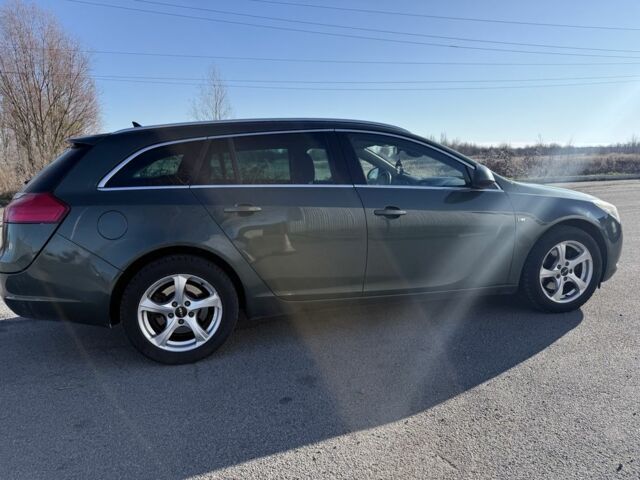 Зеленый Опель Инсигния, объемом двигателя 2 л и пробегом 280 тыс. км за 3428 $, фото 2 на Automoto.ua