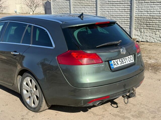Зелений Опель Інсігнія, об'ємом двигуна 2 л та пробігом 215 тис. км за 5818 $, фото 1 на Automoto.ua