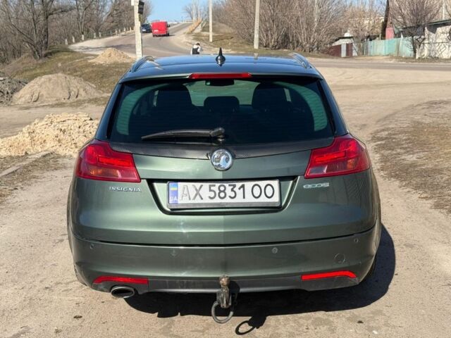 Зелений Опель Інсігнія, об'ємом двигуна 2 л та пробігом 215 тис. км за 5818 $, фото 10 на Automoto.ua