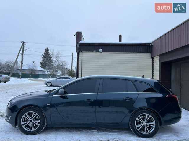 Зелений Опель Інсігнія, об'ємом двигуна 1.96 л та пробігом 208 тис. км за 10500 $, фото 4 на Automoto.ua