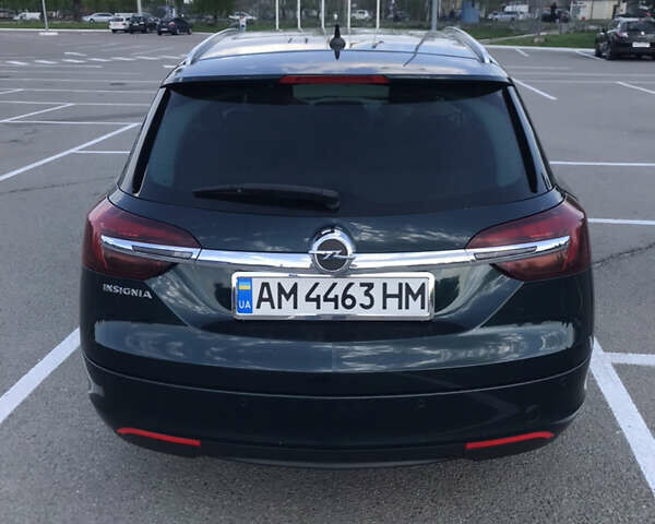 Зелений Опель Інсігнія, об'ємом двигуна 1.96 л та пробігом 201 тис. км за 10500 $, фото 3 на Automoto.ua