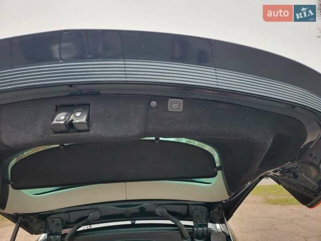 Зеленый Опель Инсигния, объемом двигателя 2 л и пробегом 252 тыс. км за 9900 $, фото 7 на Automoto.ua