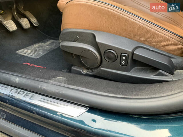 Зеленый Опель Инсигния, объемом двигателя 1.6 л и пробегом 140 тыс. км за 12350 $, фото 28 на Automoto.ua