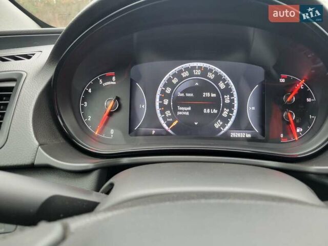 Зеленый Опель Инсигния, объемом двигателя 2 л и пробегом 252 тыс. км за 9900 $, фото 1 на Automoto.ua