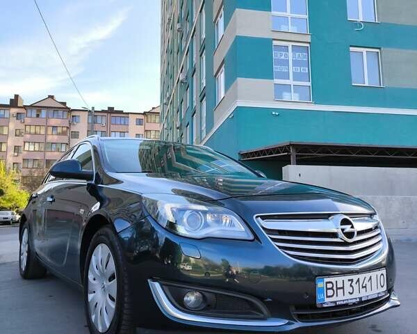 Зелений Опель Інсігнія, об'ємом двигуна 1.96 л та пробігом 273 тис. км за 11500 $, фото 10 на Automoto.ua