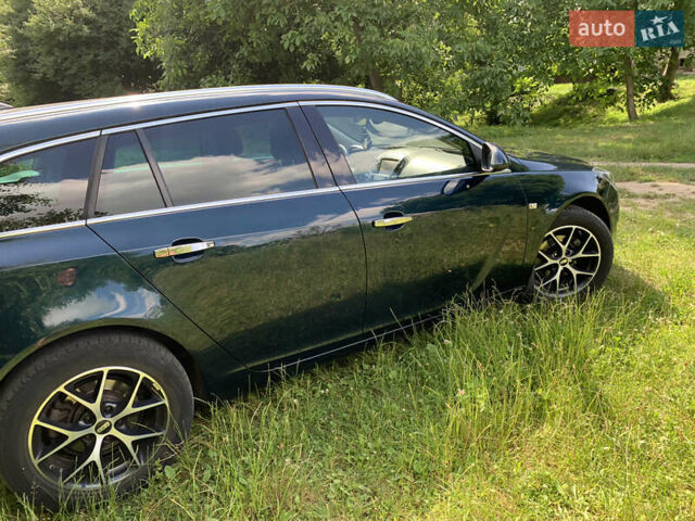 Зеленый Опель Инсигния, объемом двигателя 1.6 л и пробегом 140 тыс. км за 12350 $, фото 16 на Automoto.ua