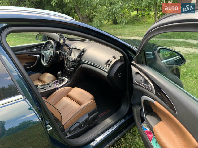 Зеленый Опель Инсигния, объемом двигателя 1.6 л и пробегом 140 тыс. км за 12350 $, фото 11 на Automoto.ua