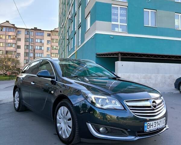 Зелений Опель Інсігнія, об'ємом двигуна 1.96 л та пробігом 273 тис. км за 11500 $, фото 2 на Automoto.ua