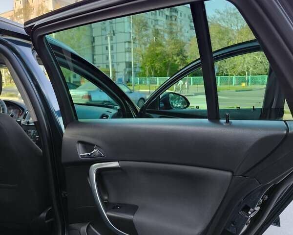 Зелений Опель Інсігнія, об'ємом двигуна 1.96 л та пробігом 273 тис. км за 11500 $, фото 27 на Automoto.ua