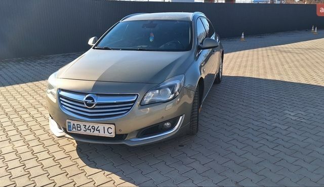 Зелений Опель Інсігнія, об'ємом двигуна 2 л та пробігом 263 тис. км за 9700 $, фото 3 на Automoto.ua