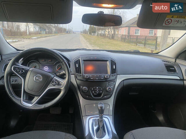 Зеленый Опель Инсигния, объемом двигателя 2 л и пробегом 220 тыс. км за 10890 $, фото 5 на Automoto.ua