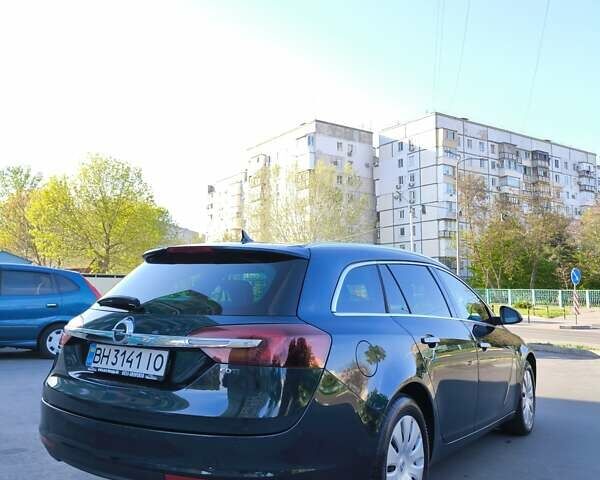 Зелений Опель Інсігнія, об'ємом двигуна 1.96 л та пробігом 273 тис. км за 11500 $, фото 5 на Automoto.ua