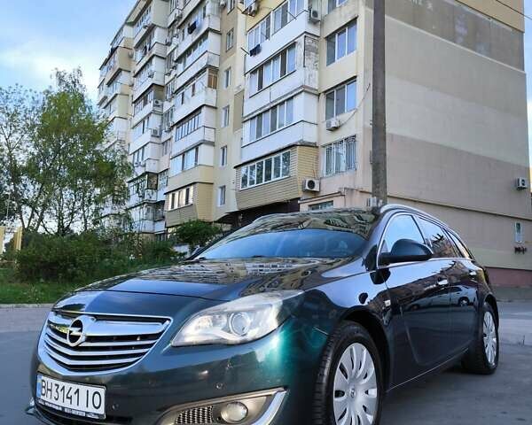 Зелений Опель Інсігнія, об'ємом двигуна 1.96 л та пробігом 273 тис. км за 11500 $, фото 11 на Automoto.ua