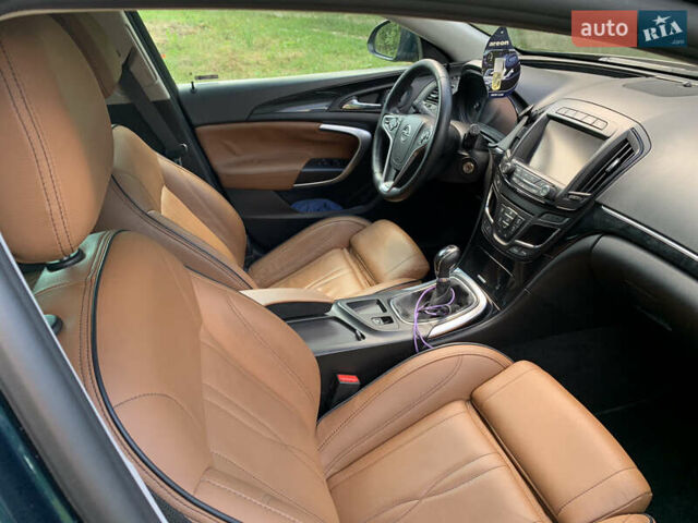 Зеленый Опель Инсигния, объемом двигателя 1.6 л и пробегом 140 тыс. км за 12350 $, фото 13 на Automoto.ua