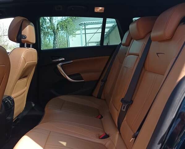 Зеленый Опель Инсигния, объемом двигателя 2.03 л и пробегом 204 тыс. км за 13200 $, фото 16 на Automoto.ua