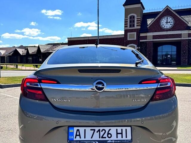 Зеленый Опель Инсигния, объемом двигателя 1.6 л и пробегом 77 тыс. км за 13900 $, фото 3 на Automoto.ua