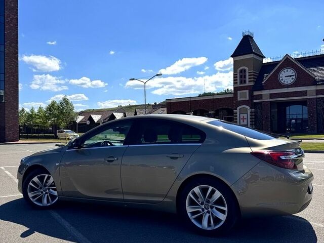 Зеленый Опель Инсигния, объемом двигателя 1.6 л и пробегом 77 тыс. км за 13900 $, фото 1 на Automoto.ua