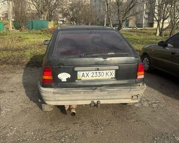 Черный Опель Кадет, объемом двигателя 1.3 л и пробегом 250 тыс. км за 450 $, фото 1 на Automoto.ua