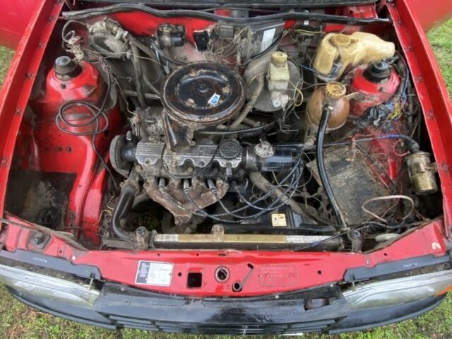 Красный Опель Кадет, объемом двигателя 1.3 л и пробегом 77 тыс. км за 550 $, фото 4 на Automoto.ua