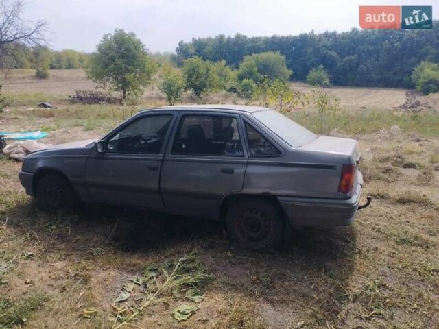 Серый Опель Кадет, объемом двигателя 1.6 л и пробегом 100 тыс. км за 500 $, фото 2 на Automoto.ua