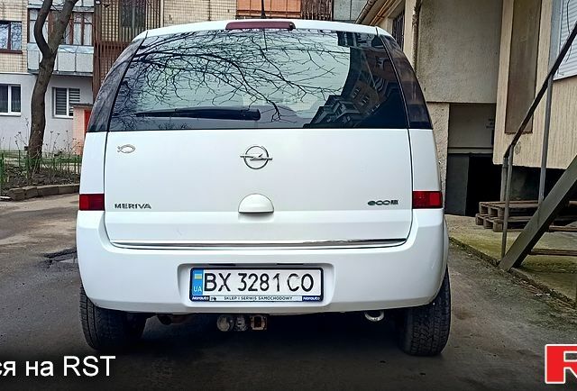 Белый Опель Мерива, объемом двигателя 1.2 л и пробегом 270 тыс. км за 5000 $, фото 1 на Automoto.ua