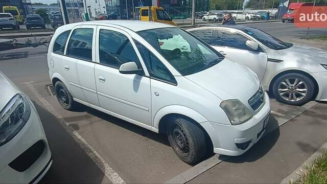 Белый Опель Мерива, объемом двигателя 1.3 л и пробегом 200 тыс. км за 3800 $, фото 9 на Automoto.ua