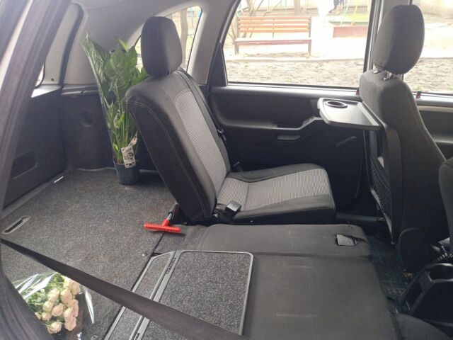 Белый Опель Мерива, объемом двигателя 1.2 л и пробегом 270 тыс. км за 4300 $, фото 5 на Automoto.ua