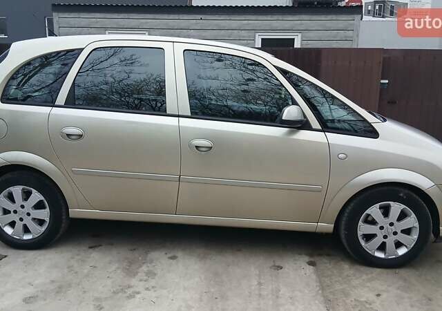 Бежевый Опель Мерива, объемом двигателя 1.6 л и пробегом 206 тыс. км за 4350 $, фото 12 на Automoto.ua