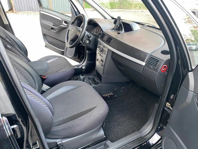 Черный Опель Мерива, объемом двигателя 1.8 л и пробегом 260 тыс. км за 5800 $, фото 11 на Automoto.ua