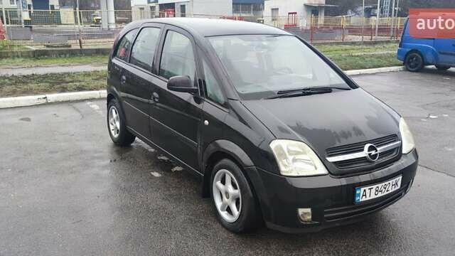 Черный Опель Мерива, объемом двигателя 1.6 л и пробегом 240 тыс. км за 3550 $, фото 3 на Automoto.ua
