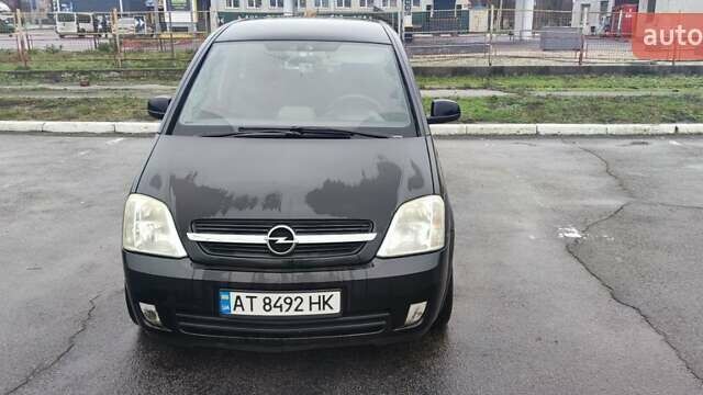 Черный Опель Мерива, объемом двигателя 1.6 л и пробегом 240 тыс. км за 3550 $, фото 2 на Automoto.ua