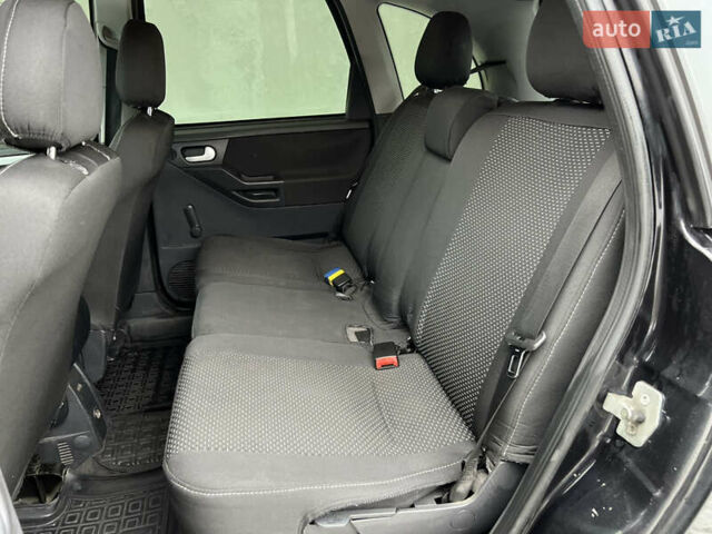 Черный Опель Мерива, объемом двигателя 1.36 л и пробегом 250 тыс. км за 3600 $, фото 21 на Automoto.ua