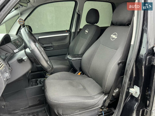 Черный Опель Мерива, объемом двигателя 1.36 л и пробегом 250 тыс. км за 3600 $, фото 20 на Automoto.ua