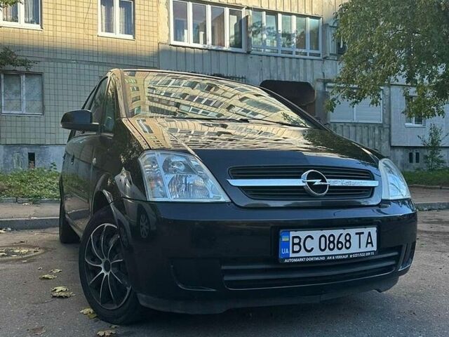 Черный Опель Мерива, объемом двигателя 1.6 л и пробегом 235 тыс. км за 4000 $, фото 1 на Automoto.ua