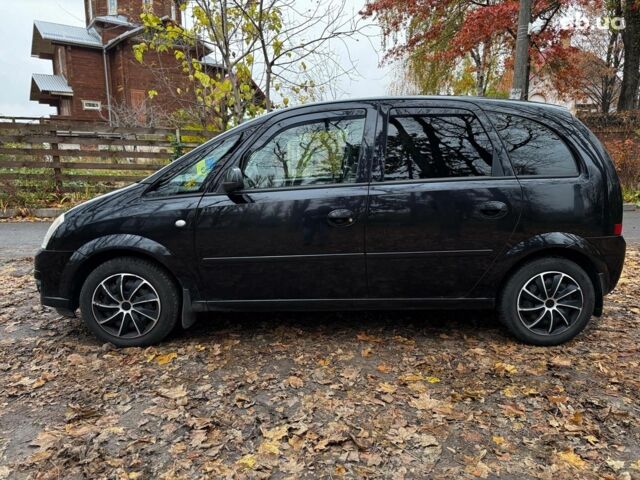 Черный Опель Мерива, объемом двигателя 1.6 л и пробегом 262 тыс. км за 4740 $, фото 14 на Automoto.ua