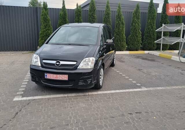 Черный Опель Мерива, объемом двигателя 1.6 л и пробегом 212 тыс. км за 4900 $, фото 12 на Automoto.ua