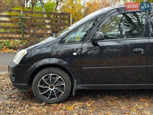 Черный Опель Мерива, объемом двигателя 1.6 л и пробегом 262 тыс. км за 4740 $, фото 15 на Automoto.ua