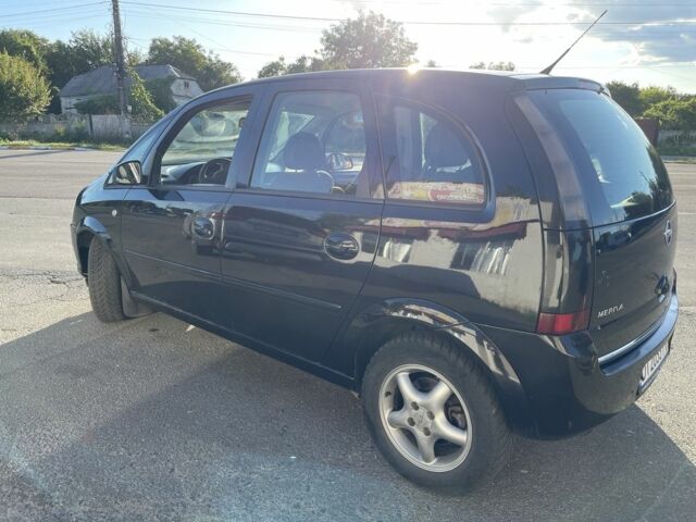 Черный Опель Мерива, объемом двигателя 1.6 л и пробегом 312 тыс. км за 3800 $, фото 3 на Automoto.ua