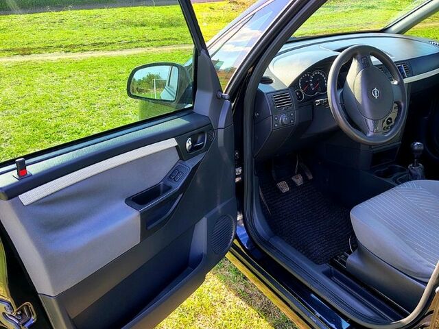 Черный Опель Мерива, объемом двигателя 1.4 л и пробегом 184 тыс. км за 5000 $, фото 9 на Automoto.ua