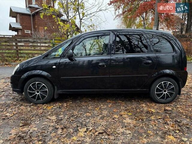 Черный Опель Мерива, объемом двигателя 1.6 л и пробегом 262 тыс. км за 4740 $, фото 14 на Automoto.ua