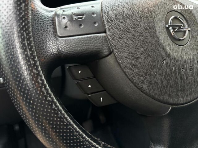 Черный Опель Мерива, объемом двигателя 1.6 л и пробегом 262 тыс. км за 4740 $, фото 25 на Automoto.ua