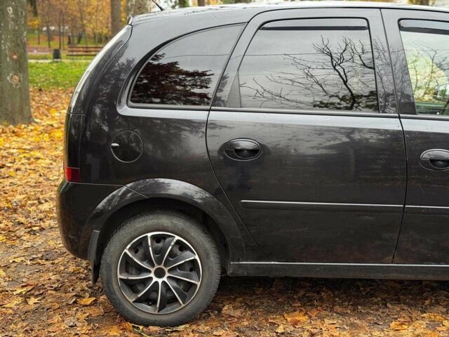 Черный Опель Мерива, объемом двигателя 1.6 л и пробегом 262 тыс. км за 4740 $, фото 7 на Automoto.ua