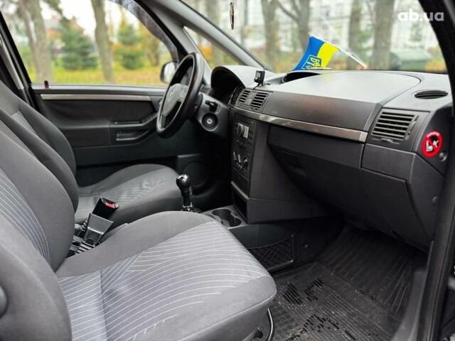 Черный Опель Мерива, объемом двигателя 1.6 л и пробегом 262 тыс. км за 4740 $, фото 30 на Automoto.ua