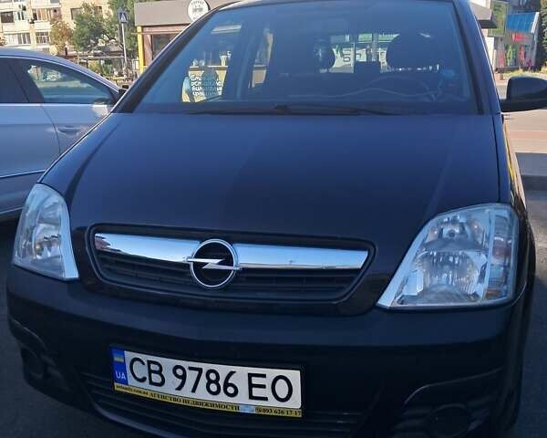 Черный Опель Мерива, объемом двигателя 1.6 л и пробегом 262 тыс. км за 4100 $, фото 3 на Automoto.ua