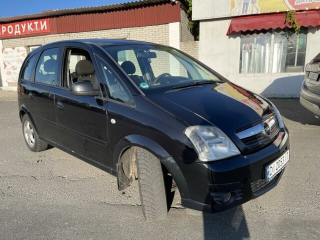 Черный Опель Мерива, объемом двигателя 1.6 л и пробегом 312 тыс. км за 3800 $, фото 1 на Automoto.ua