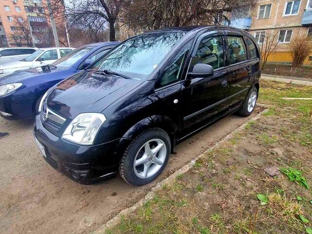 Чорний Опель Меріва, об'ємом двигуна 1.4 л та пробігом 177 тис. км за 4000 $, фото 1 на Automoto.ua