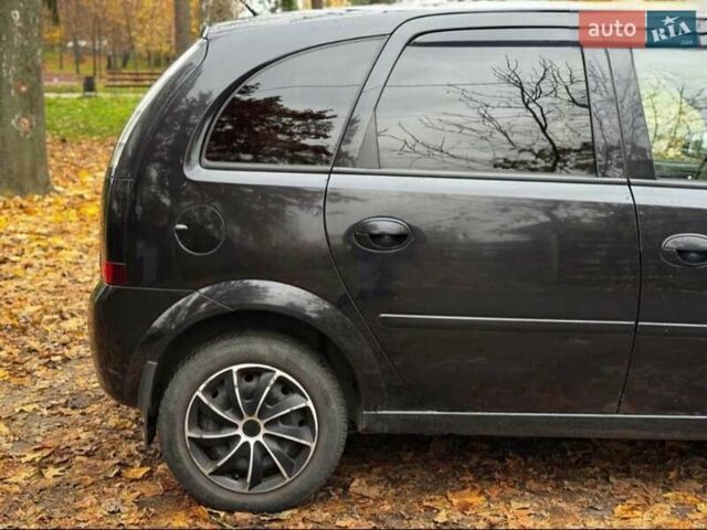 Черный Опель Мерива, объемом двигателя 1.6 л и пробегом 262 тыс. км за 4100 $, фото 7 на Automoto.ua