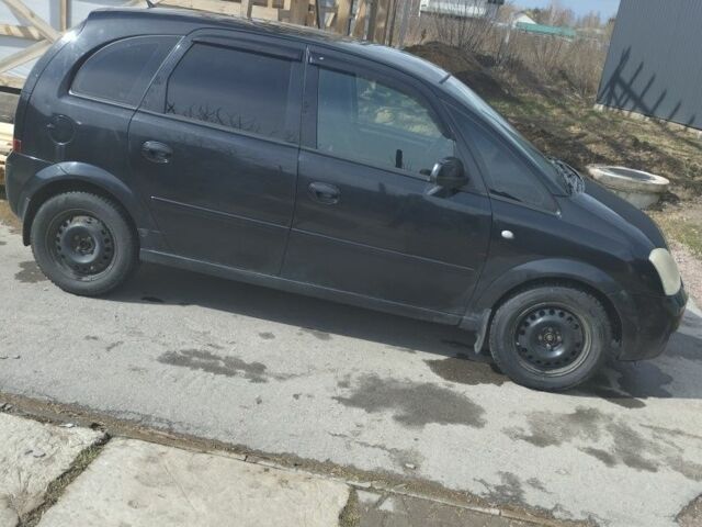 Черный Опель Мерива, объемом двигателя 1.4 л и пробегом 270 тыс. км за 4100 $, фото 4 на Automoto.ua