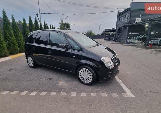 Черный Опель Мерива, объемом двигателя 1.6 л и пробегом 212 тыс. км за 4900 $, фото 8 на Automoto.ua