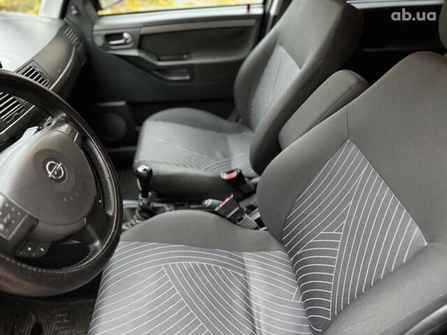 Черный Опель Мерива, объемом двигателя 1.6 л и пробегом 262 тыс. км за 4740 $, фото 24 на Automoto.ua